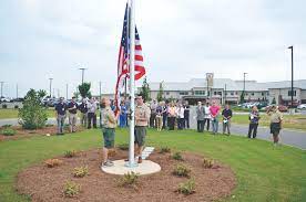 raising a flag on a new flagpole