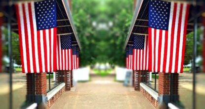 Displaying flags along walkways