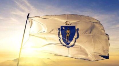 Massachusetts state of United States flag on flagpole