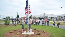 raising a flag on a new flagpole