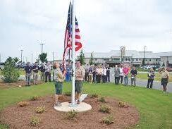 raising a flag on a new flagpole